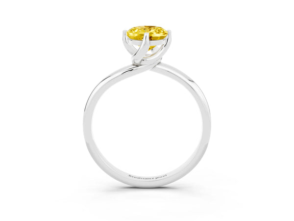 Silver Oval Cut Yellow Sapphire Solitaire Engagement Ring with Four-Prong Setting and Classic Band