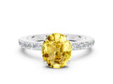 White gold Oval Cut Yellow Sapphire Solitaire Engagement Ring with Pavé Band and Four-Prong Setting_24