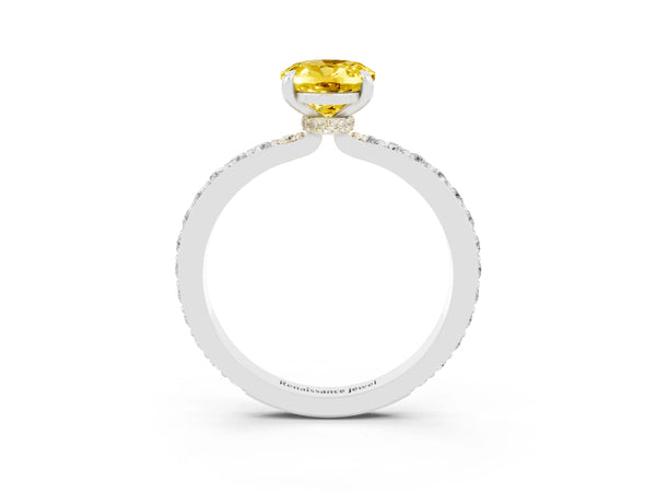 Platinum Oval Cut Yellow Sapphire Solitaire Engagement Ring with Pavé Band and Four-Prong Setting