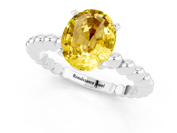 Silver Oval Cut Yellow Sapphire Solitaire Ring with Beaded Band and Prong Setting