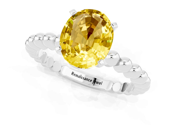 Platinum Oval Cut Yellow Sapphire Solitaire Ring with Beaded Band and Prong Setting