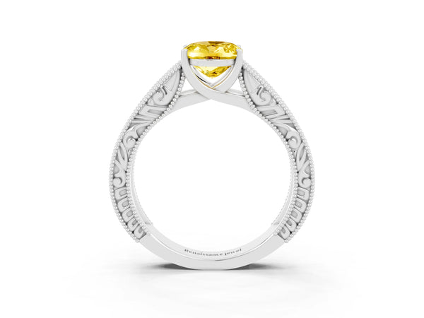 Silver Oval Cut Yellow Sapphire Solitaire Ring with Engraved Band and Four-Prong Setting