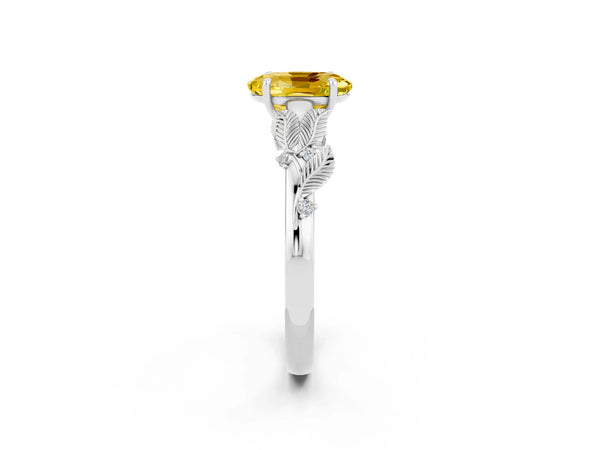 Silver Oval Cut Yellow Sapphire Solitaire Ring with Leaf Motif Band and Four-Prong Setting