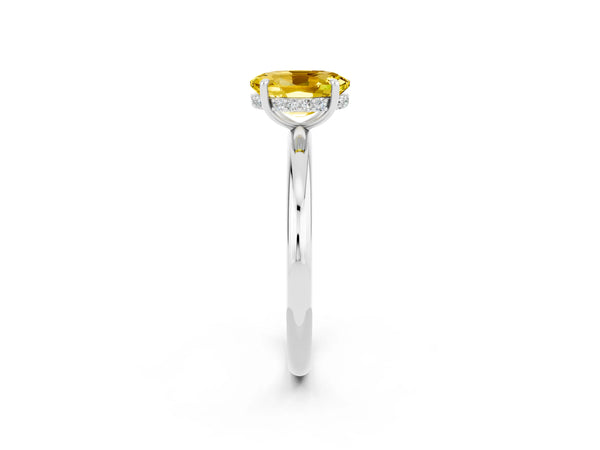 Silver Oval Cut Yellow Sapphire Solitaire Ring with Thin Band and Four-Prong Setting