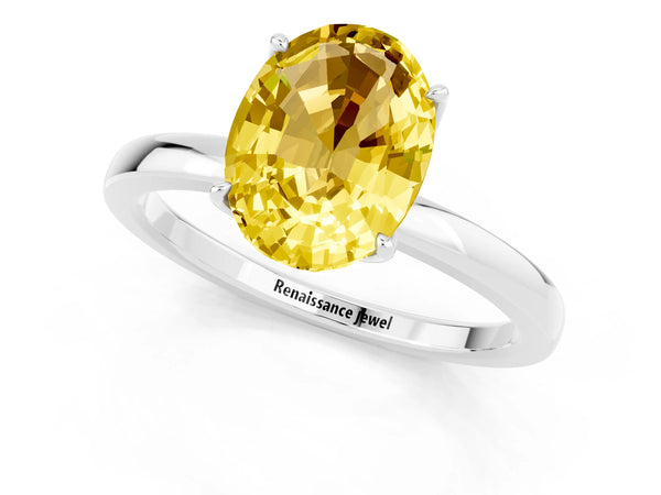 Silver Oval Cut Yellow Sapphire Solitaire Ring with Thin Band and Prong Setting