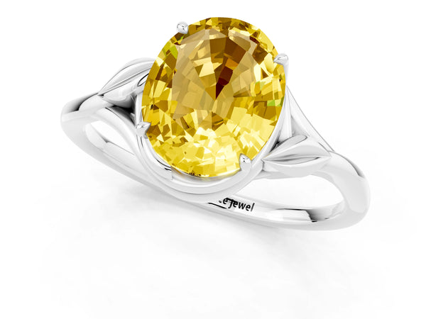 Silver Oval Cut Yellow Sapphire Solitaire Ring with Twist Band and Four-Prong Setting