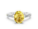 White gold Oval Cut Yellow Sapphire Solitaire with Side Baguettes and Channel Set Band_24