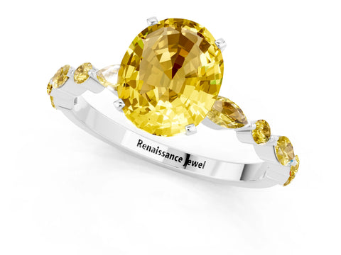 White gold Oval Cut Yellow Sapphire Solitaire with Side Stones on a Pavé Band and Four-Prong Setting_1
