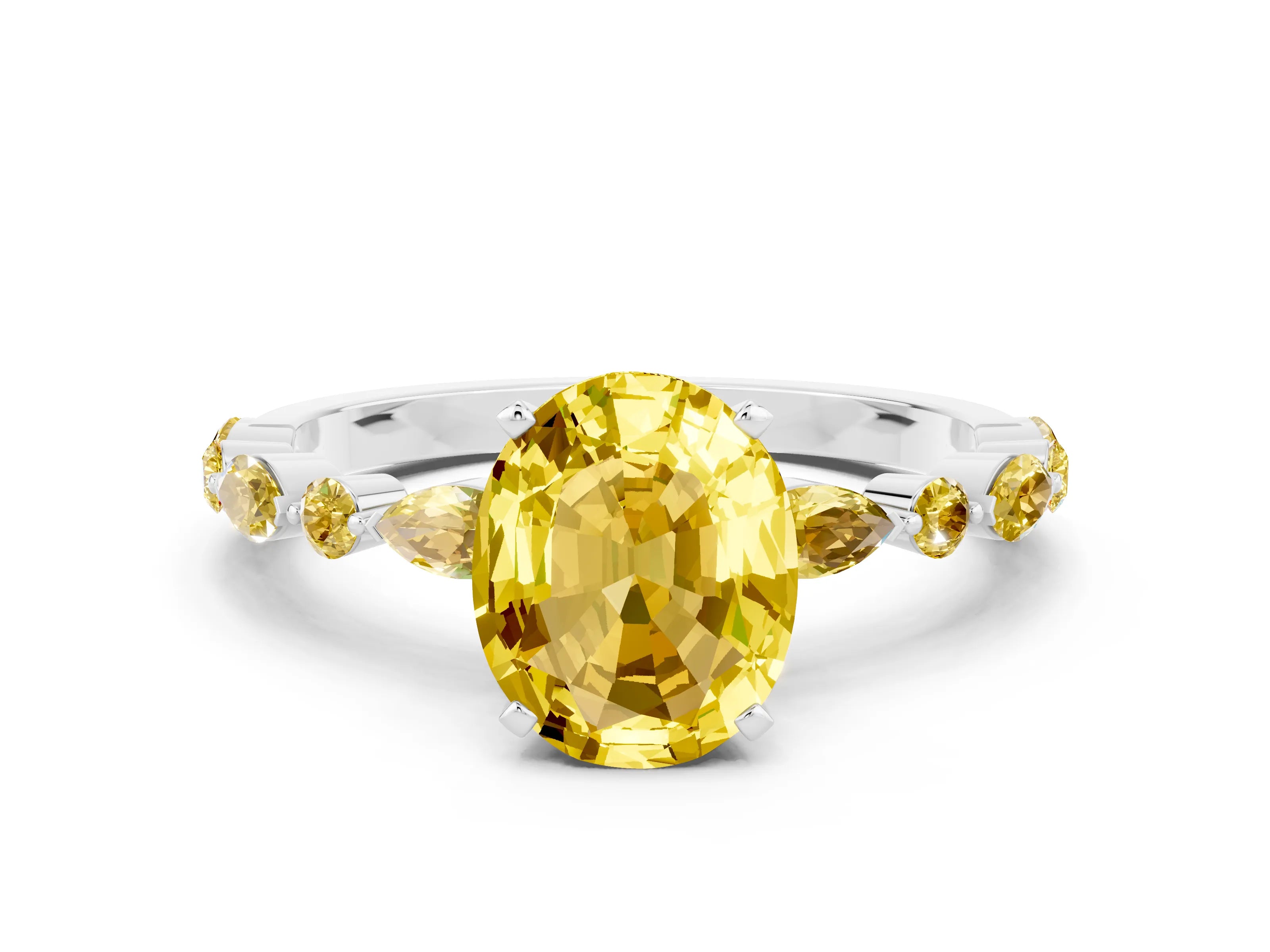 White gold Oval Cut Yellow Sapphire Solitaire with Side Stones on a Pavé Band and Four-Prong Setting
