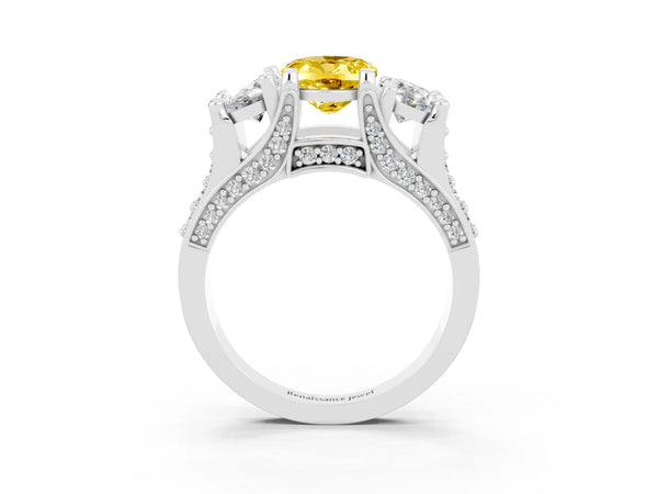 Silver Oval Cut Yellow Sapphire Three-Stone Ring with Channel Set Band and Four-Prong Setting
