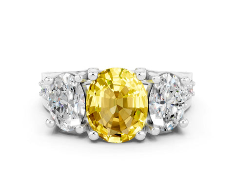 White gold Oval Cut Yellow Sapphire Three-Stone Ring with Channel Set Band and Four-Prong Setting