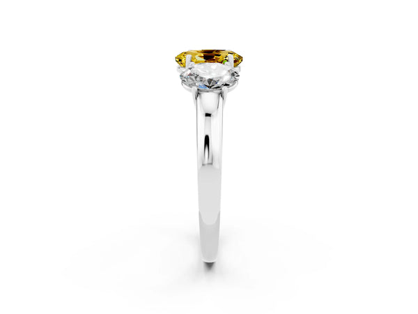 Platinum Oval Cut Yellow Sapphire Three-Stone Ring with Four-Prong Setting and Classic Band