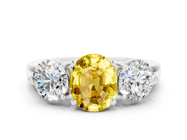 Silver Oval Cut Yellow Sapphire Three-Stone Ring with Prong Setting and Classic Band