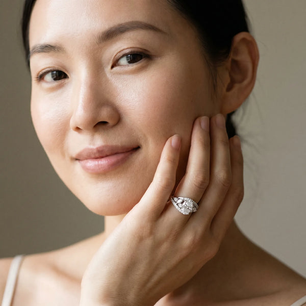 White gold Oval Diamond Halo Ring with Marquise and Pavé Band in Prong Setting