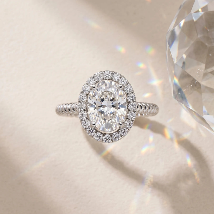 White gold Oval Diamond Halo Ring with Twisted Band and Prong Setting