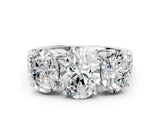 Platinum 4.01 Carat F VVS2 Oval Diamond Three-Stone Ring with Prong Setting and Textured Band