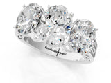 Platinum 4.01 Carat F VVS2 Oval Diamond Three-Stone Ring with Prong Setting and Textured Band