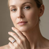 Platinum 4.01 Carat F VVS2 Oval Diamond Three-Stone Ring with Prong Setting and Textured Band