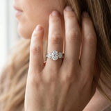 Platinum 4.01 Carat F VVS2 Oval Diamond Three-Stone Ring with Prong Setting and Textured Band