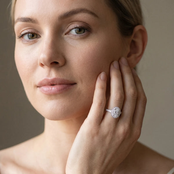 White gold Oval Halo Diamond Engagement Ring with Pave Band and Four-Prong Setting