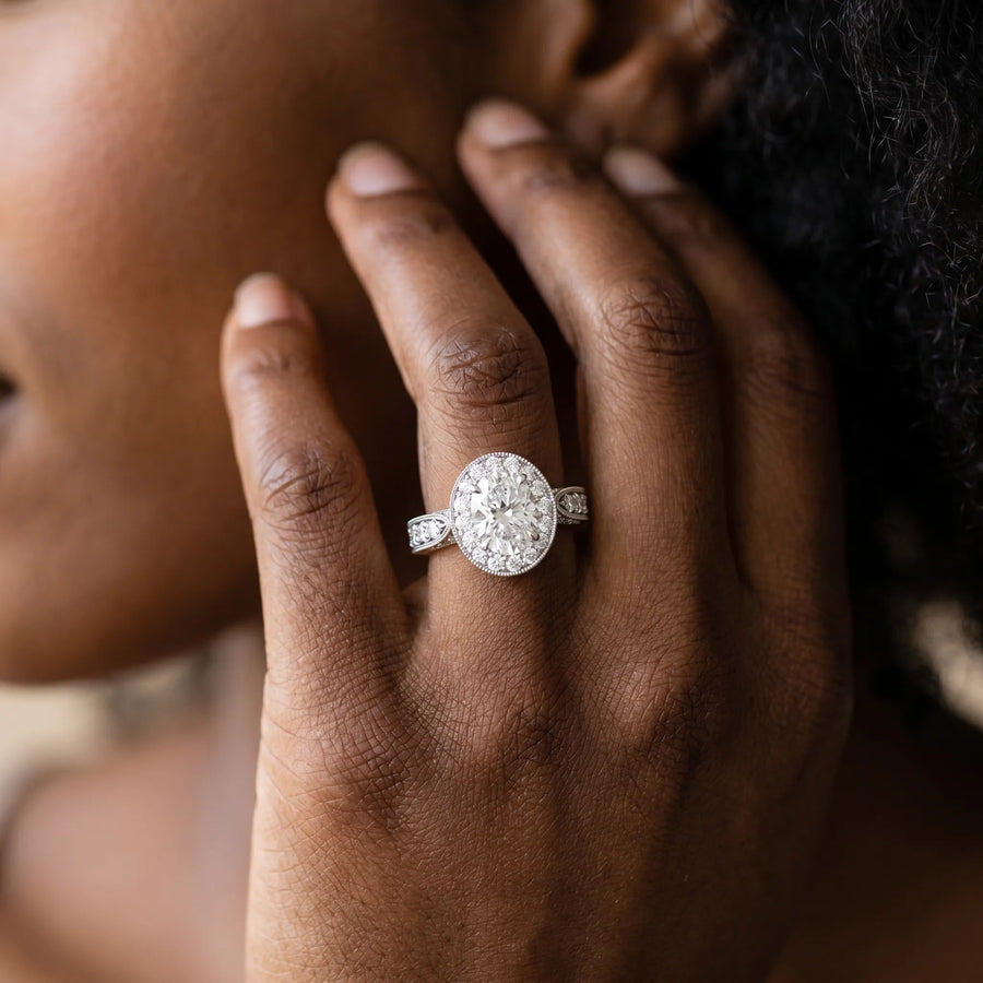 White gold Oval Halo Diamond Engagement Ring with Split Shank Band and Four-Prong Setting