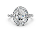 White gold Oval Halo Diamond Engagement Ring with Twisted Band and Four-Prong Setting