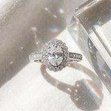 White gold Oval Halo Diamond Ring with Pavé Band and Four-Prong Setting_9