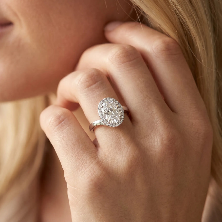 White gold Oval Halo Solitaire Diamond Ring with Split Shank and Prong Setting