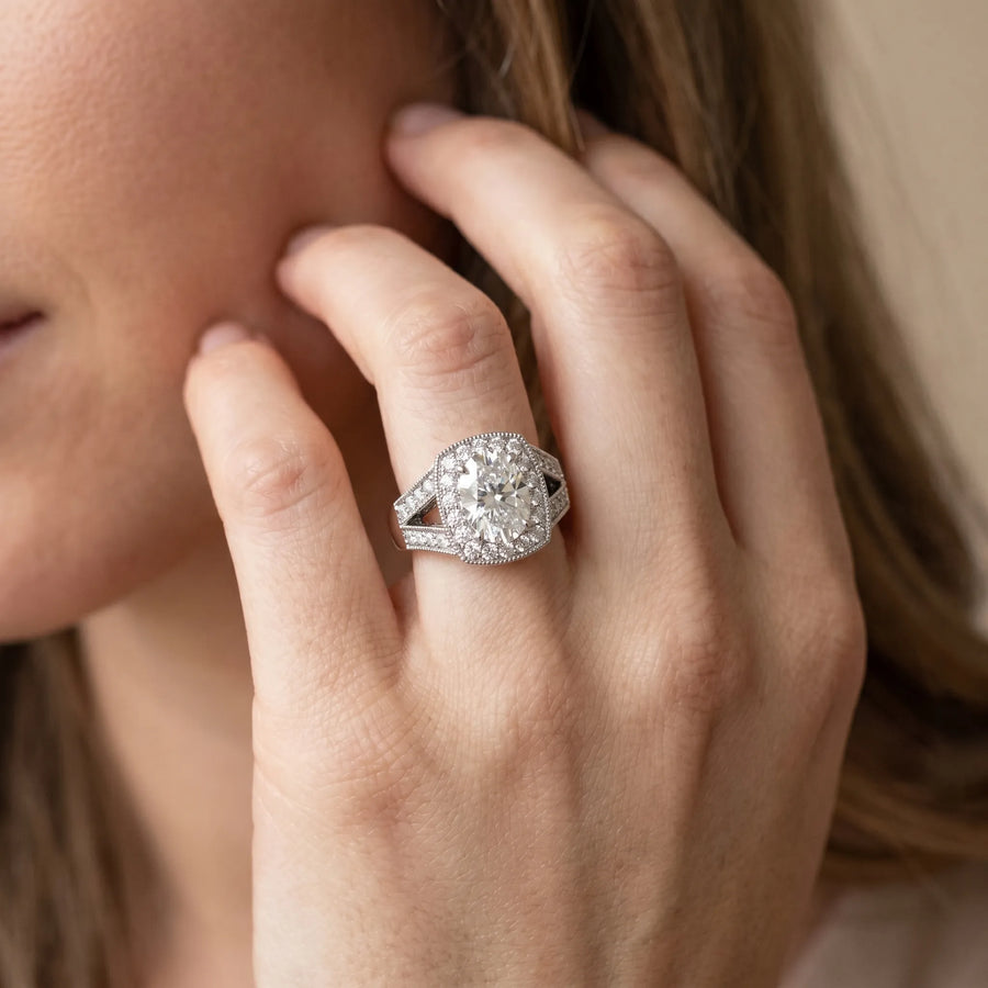 White gold Oval Halo Split Shank Diamond Ring with Milgrain Prong Setting