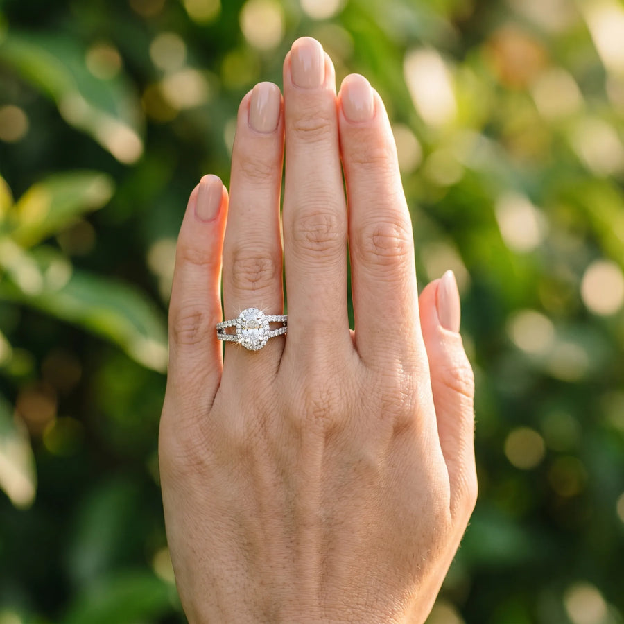 White gold Oval Halo Split Shank Diamond Ring with Prong Setting