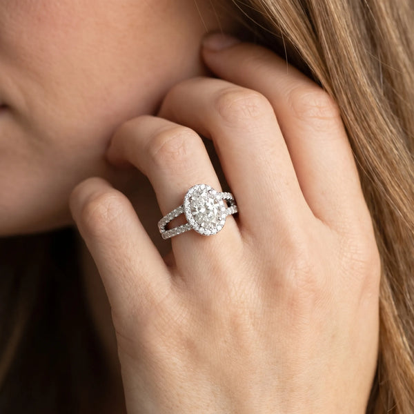 White gold Oval Halo Split Shank Diamond Ring with Prong Setting