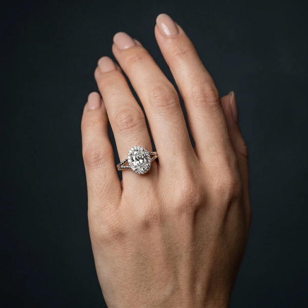 White gold Oval Halo Split Shank Twisted Band Prong Set Ring