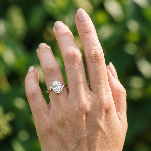 White gold Oval Halo Twist Band with Four-Prong Setting