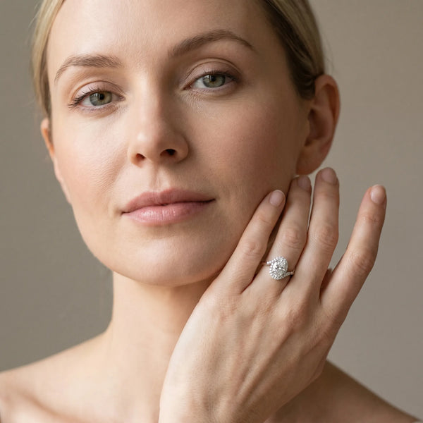 White gold Oval Halo Twist Band with Four-Prong Setting