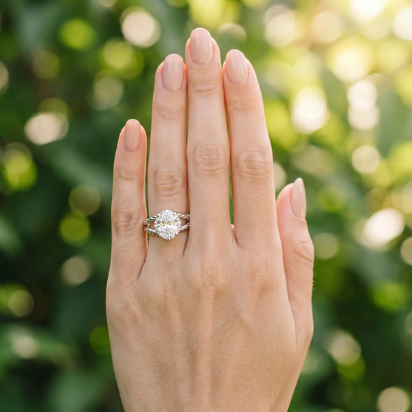 White gold Oval Halo Twisted Band Four-Prong Ring