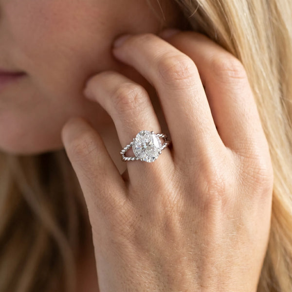 White gold Oval Halo Twisted Band Four-Prong Ring