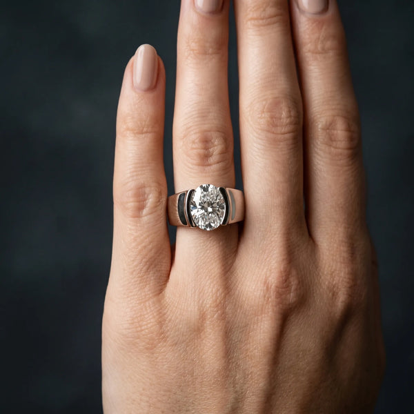 White gold Oval Solitaire Bezel Set Diamond Ring with Wide Band