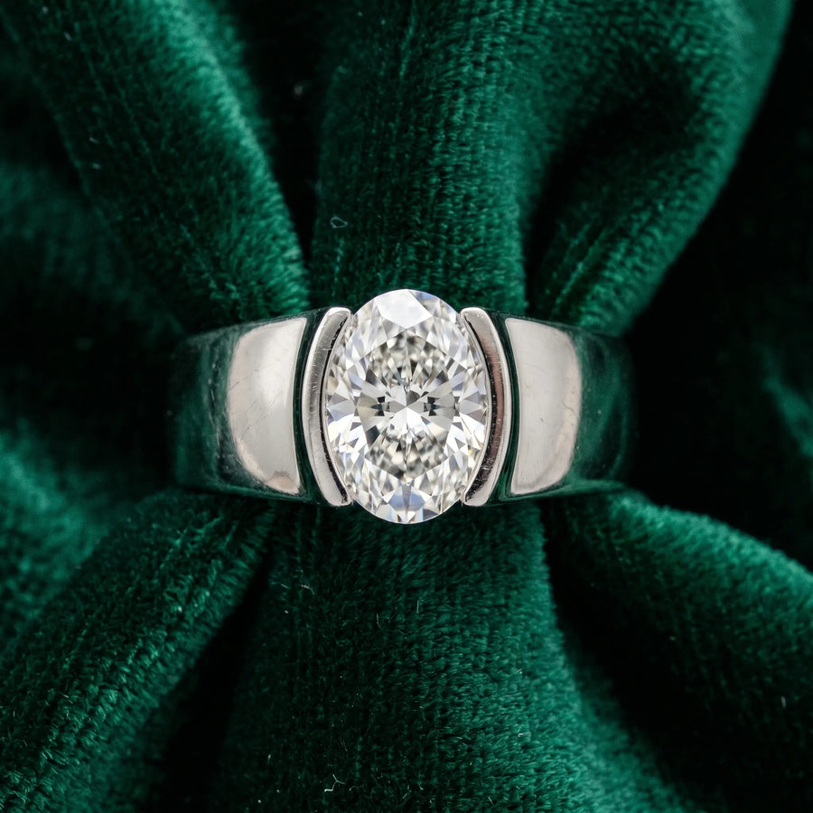 White gold Oval Solitaire Bezel Set Diamond Ring with Wide Band