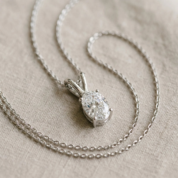 White gold Oval Solitaire Diamond Prong Pendant