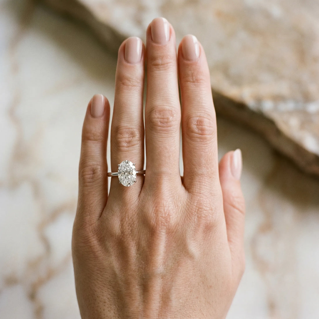 White gold Oval Solitaire Diamond Ring with Split Shank and Four-Prong Setting_37