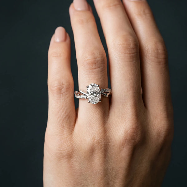 White gold Oval Solitaire Diamond Twist Band with Four-Prong Setting