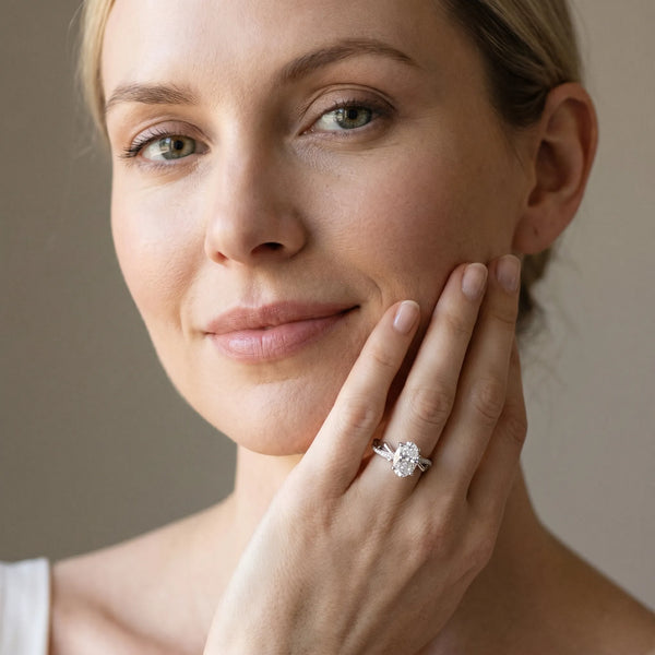 White gold Oval Solitaire Diamond Twist Band with Four-Prong Setting