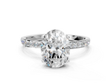 10K White Gold 0.53 Carat D VS1 Oval Diamond Solitaire Engagement Ring with Round  Pavé Band and Prong Setting