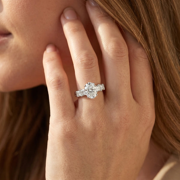 White gold Oval Solitaire Princess Side Stone Engraved Band Prong Setting Ring