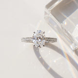 White gold Oval Solitaire Prong Set Diamond Engagement Ring with Pave Band_9