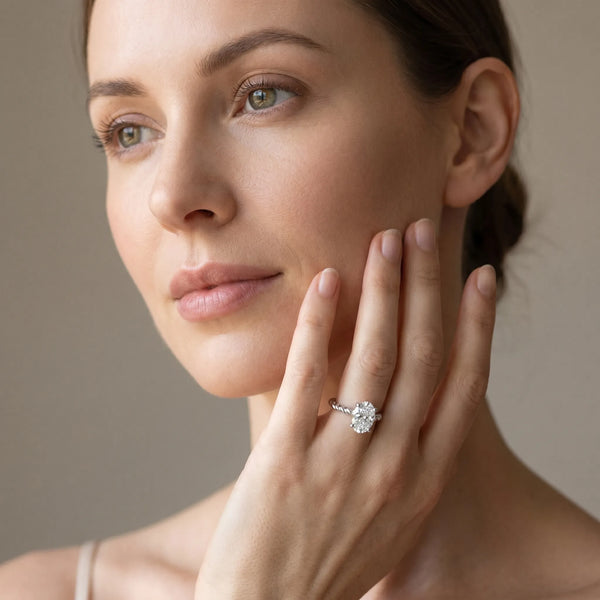 White gold Oval Solitaire Twisted Band 4-Prong Ring
