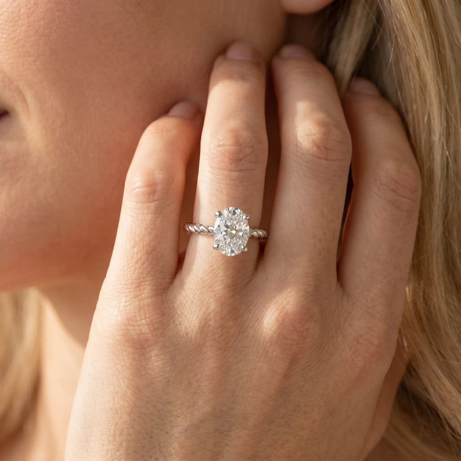 White gold Oval Solitaire Twisted Band 4-Prong Ring