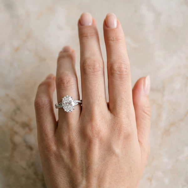 White gold Oval Solitaire Twisted Pave Diamond Ring with Four-Prong Setting