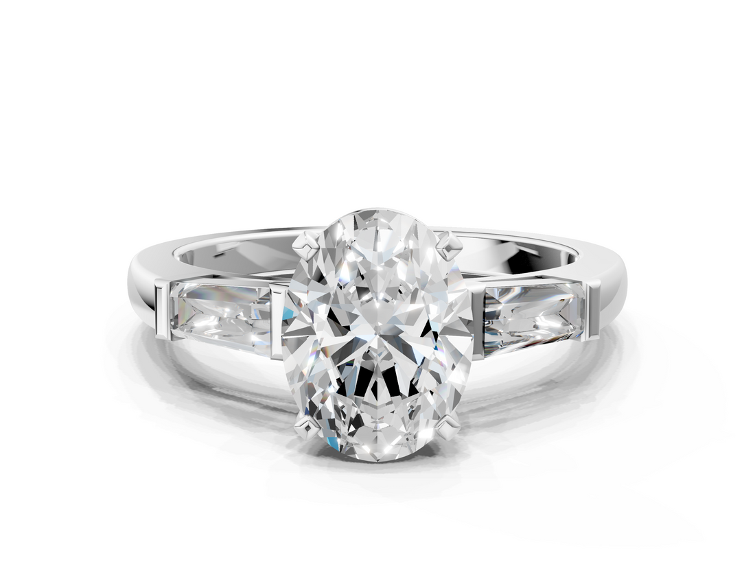 White gold Oval Solitaire with Tapered Baguette Side Stones on a Classic Band with Four-Prong Setting_168