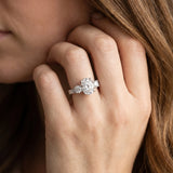 White gold Oval Three-Stone Diamond Ring with Pavé Band and Four-Prong Setting_59